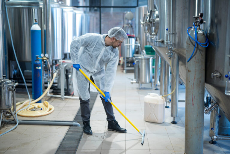 Commercial cleaner working in an industrial facility in Canberra